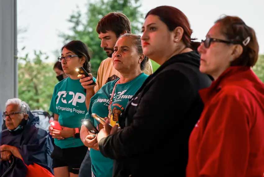 Prayer Vigils, In San Antonio, tears, prayers and rain at a vigil for migrants who died in a sweltering trailer